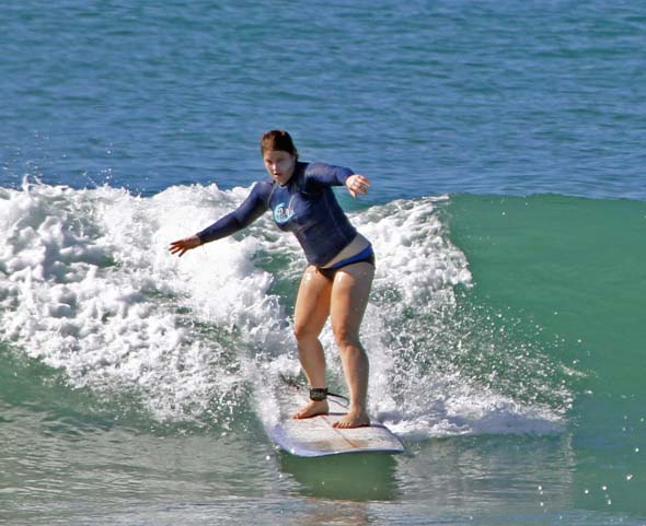 women surf adventure