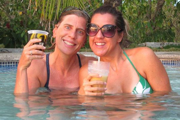 Women Having Drinks At The Pool At Surf Camp Costa Rica