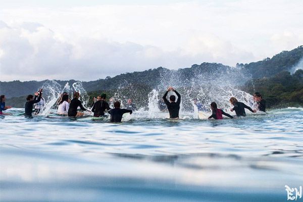 Guests Splashing Water during their Surf Retreat