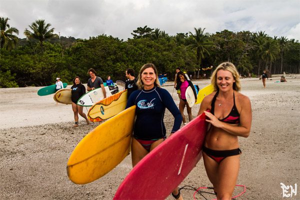 Guests Walking with Surfboards At Surf Camp Costa Rica