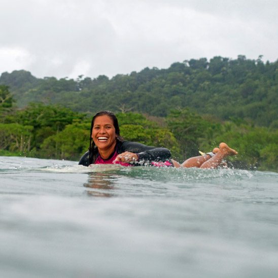 Woman Surfing At Costa Rica Surf Camp