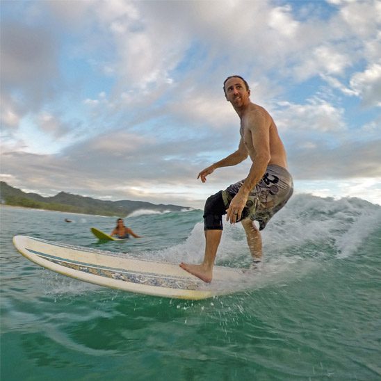Man Surfing In Costa Rica Surf Camp