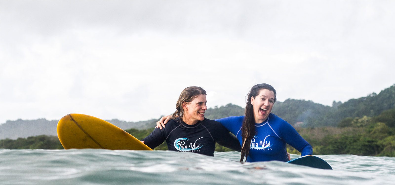 Women Surfing in Surf and Yoga Retreat Costa Rica