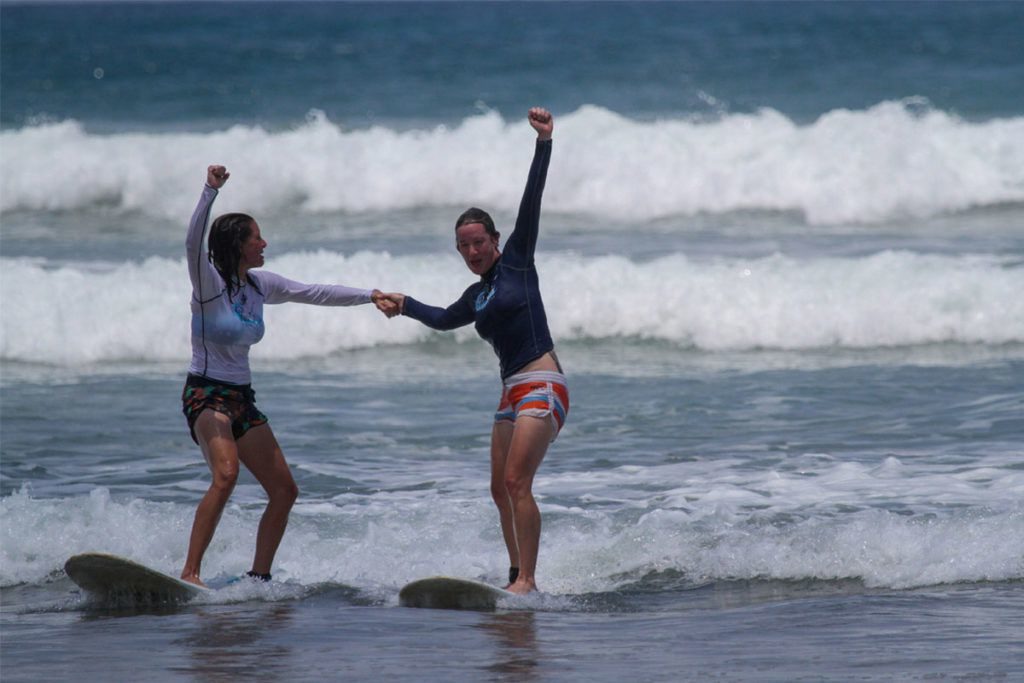 Guest Surfing and Celebrating at Surf Camp Costa Rica