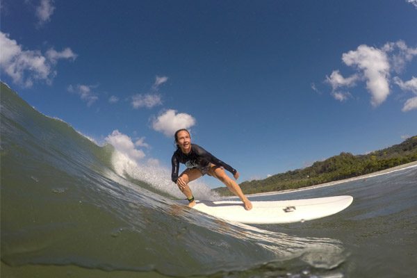 Woman Surfing in Costa Rica