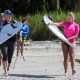 Women over 50 Walking with surfboards at Pura Vida Adventures Surf Camp