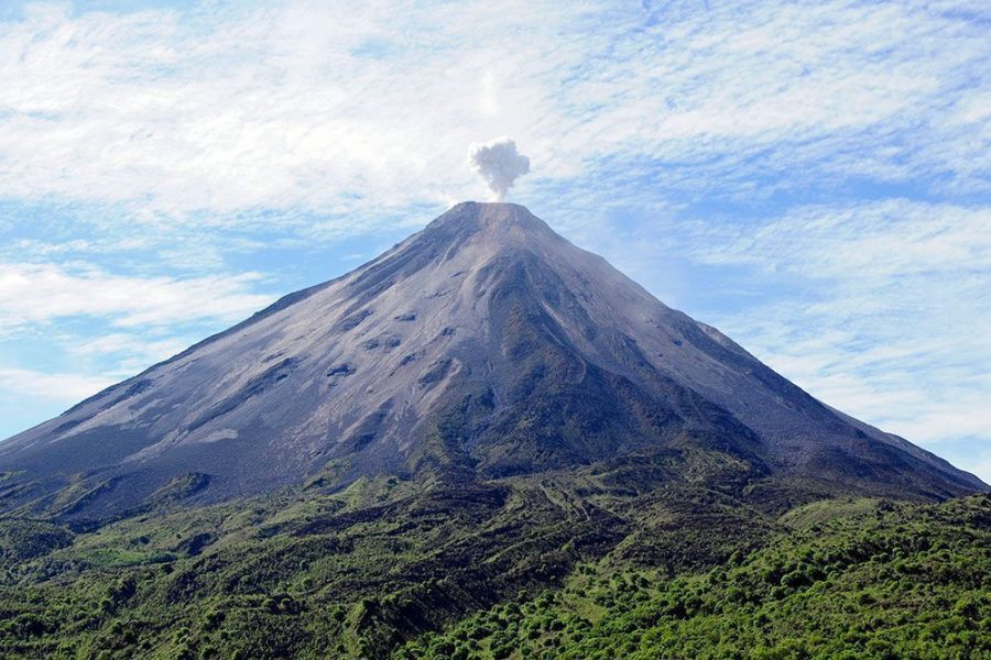 volcano with smoke coming from the crater