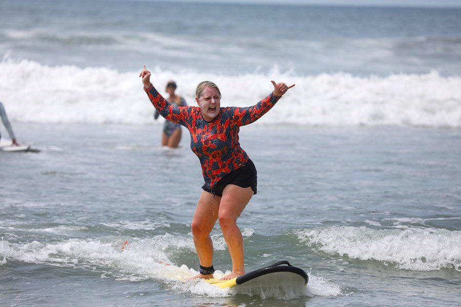 Women over 50 surfing Playa Carmen